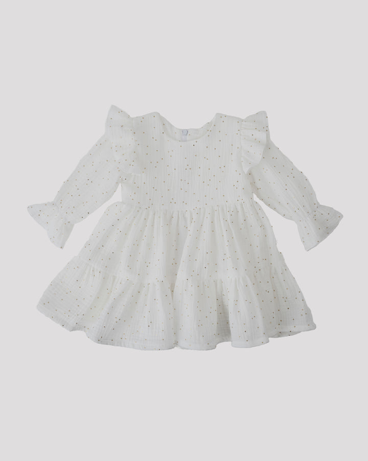 A white dress with ruffled sleeves and a ruffled collar, featuring a polka dot pattern.