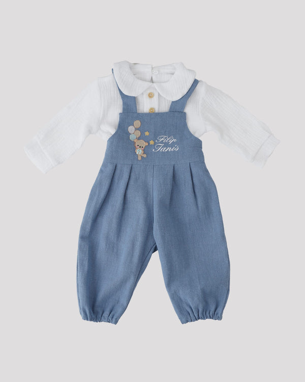 A blue jumpsuit with a white shirt underneath, featuring a cartoon character on the front.