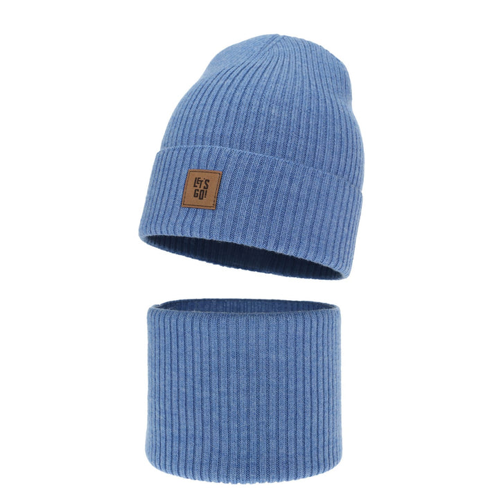 A blue knit beanie with a brown patch on the front, and a matching blue ribbed cowl that appears to be a part of the same outfit.