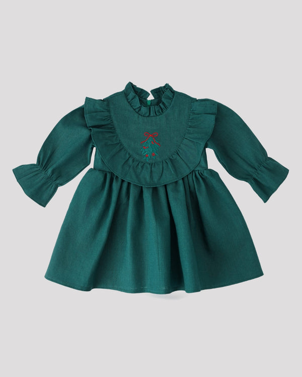 A green dress with ruffled sleeves and a bow on the neckline.