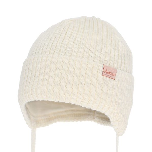 A white knit beanie with a pink label on the front.
