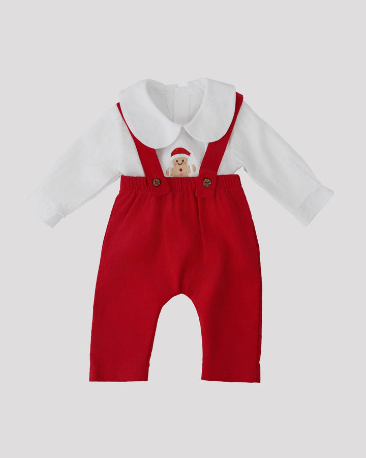 A red jumpsuit with a white collar and buttons, featuring a small Santa Claus figure on the front.