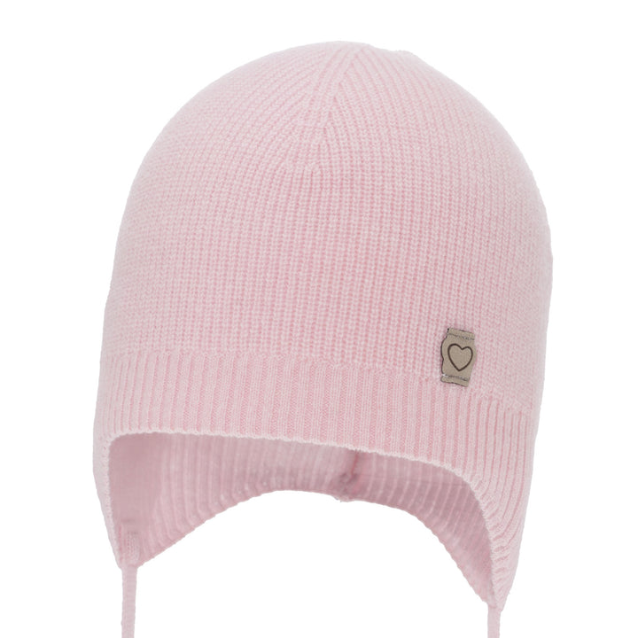 A pink knit hat with a small heart-shaped patch on the front.