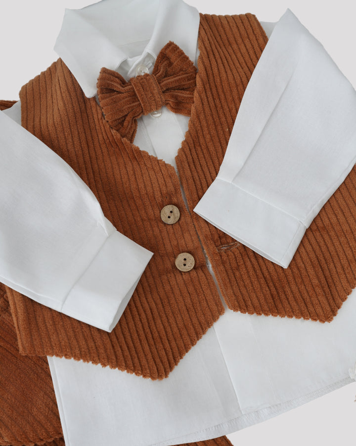 A brown corduroy vest, white shirt, and brown bow tie are displayed together.