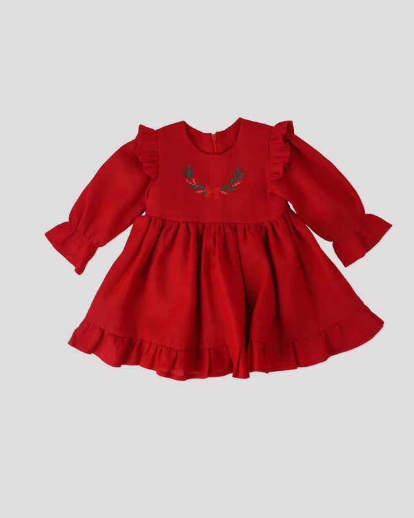 A red dress with ruffled sleeves and a ruffled hem, featuring a floral embroidered design on the front.