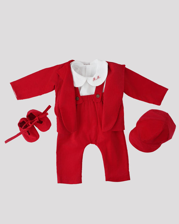 A red suit, white shirt, red shoes, and a red hat are arranged on a white background.